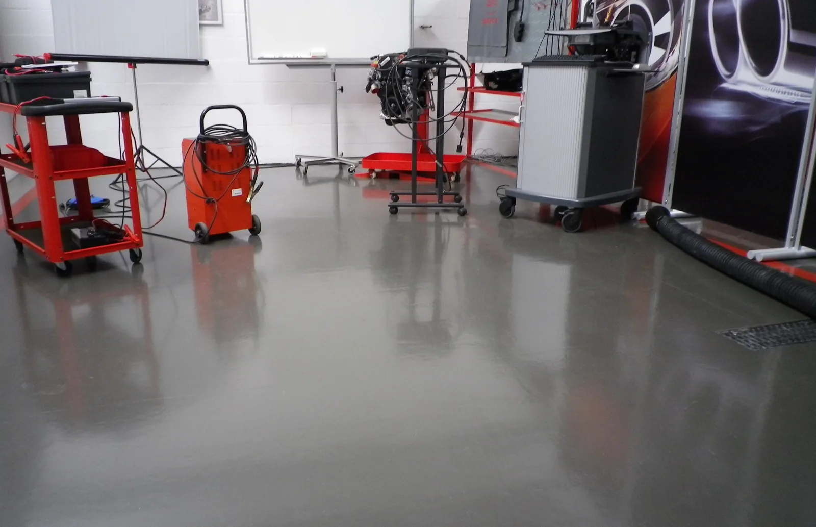 Grey Sika Ucrete MF floor in a workshop with tool trolleys